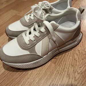 Stylish White and Tan Sneakers